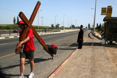 A Jewish gentleman watches the cross pass by. The cross is carried by Counties evangelist Clive Cornish through Israel during a project called From Jerusalem to Rome in the Footsteps of the Apostle Paul. A Jewish gentleman watches the cross pass by. The cross is carried by Counties evangelist Clive Cornish through Israel during a project called From Jerusalem to Rome in the Footsteps of the Apostle Paul.