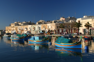 Local fishing boats in Malta in a traditional Maltese harbour photographed during a project called From Jerusalem to Rome in the Footsteps of the Apostle Paul. Local fishing boats in Malta in a traditional Maltese harbour photographed during a project called From Jerusalem to Rome in the Footsteps of the Apostle Paul.
