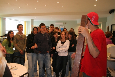 Counties evangelist Clive Cornish talks with children inside a school in Syracuse Sicily – photographed with his cross during a project called From Jerusalem to Rome in the Footsteps of the Apostle Paul. Counties evangelist Clive Cornish talks with children inside a school in Syracuse Sicily - photographed with his cross during a project called From Jerusalem to Rome in the Footsteps of the Apostle Paul.
