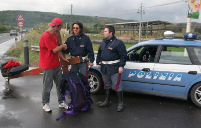 Counties evangelist Clive Cornish talks with local police while walking through Sicily wth his cross – photographed during a project called From Jerusalem to Rome in the Footsteps of the Apostle Paul. Counties evangelist Clive Cornish talks with local police while walking through Sicily wth his cross - photographed during a project called From Jerusalem to Rome in the Footsteps of the Apostle Paul.
