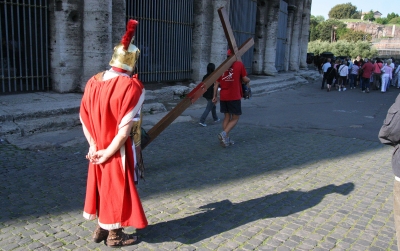 A Roman soldier stares at Counties evangelist Clive Cornish outside the Coliseum in Rome - photographed during a project called From Jerusalem to Rome in the Footsteps of the Apostle Paul.