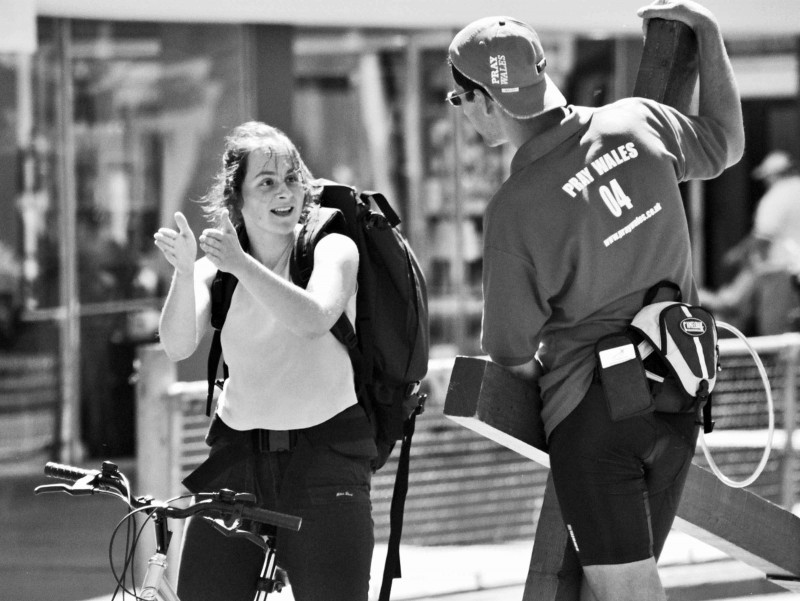 Clive talking with a girl on a bicycle during a pilgrim walk in Wales